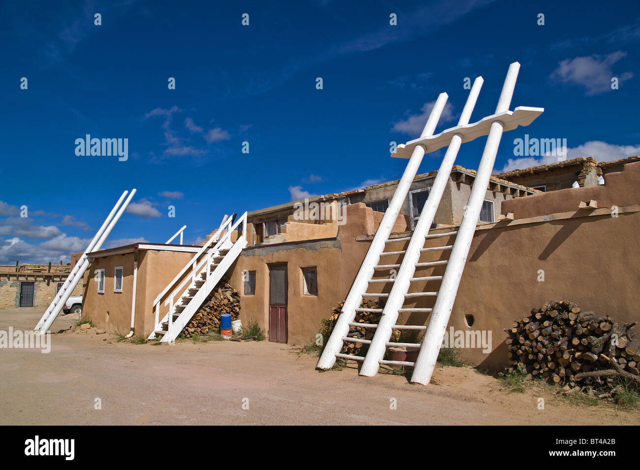 Kivas and white ladders in Sky City, the Acoma Pueblo, New Mexico, USA Stock Photo