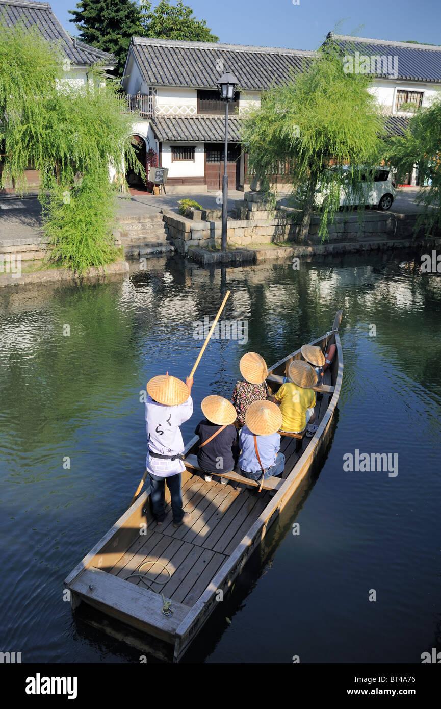 Japanese tourists on a boat in bikan area, Okayama, Kurashiki, Japan