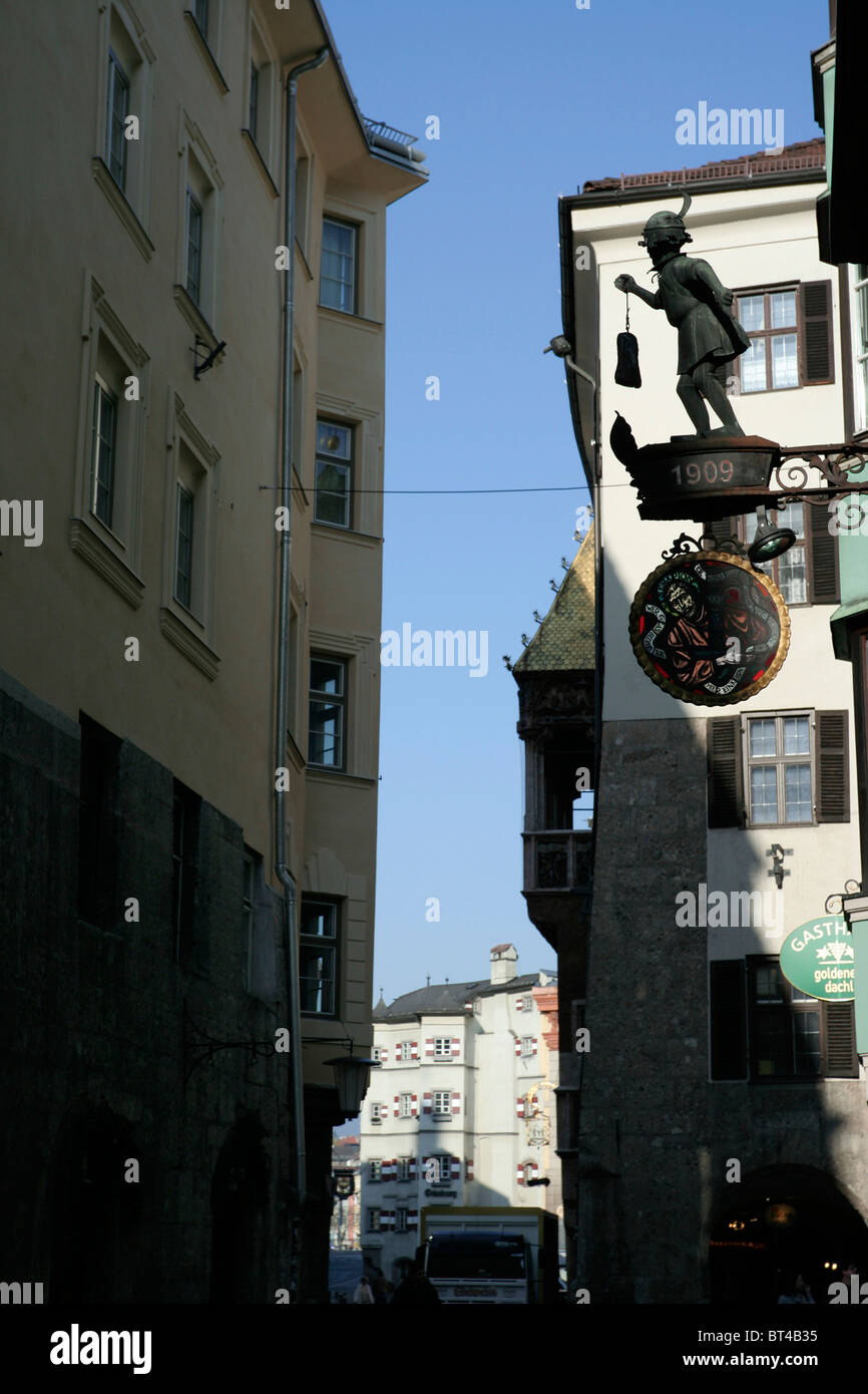 Medieval sign outside a shop in Innsbruck, Austria. Stock Photo