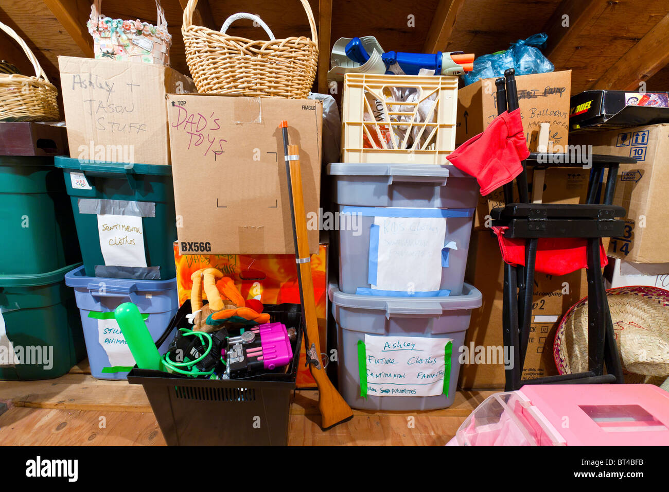 Boxes, Books and other things in Attic Storage. Stock Photo