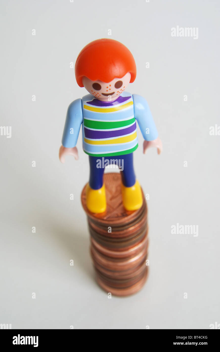 Personal finance savings education tuition fees Children money saving pennies cost childcare Stock Photo