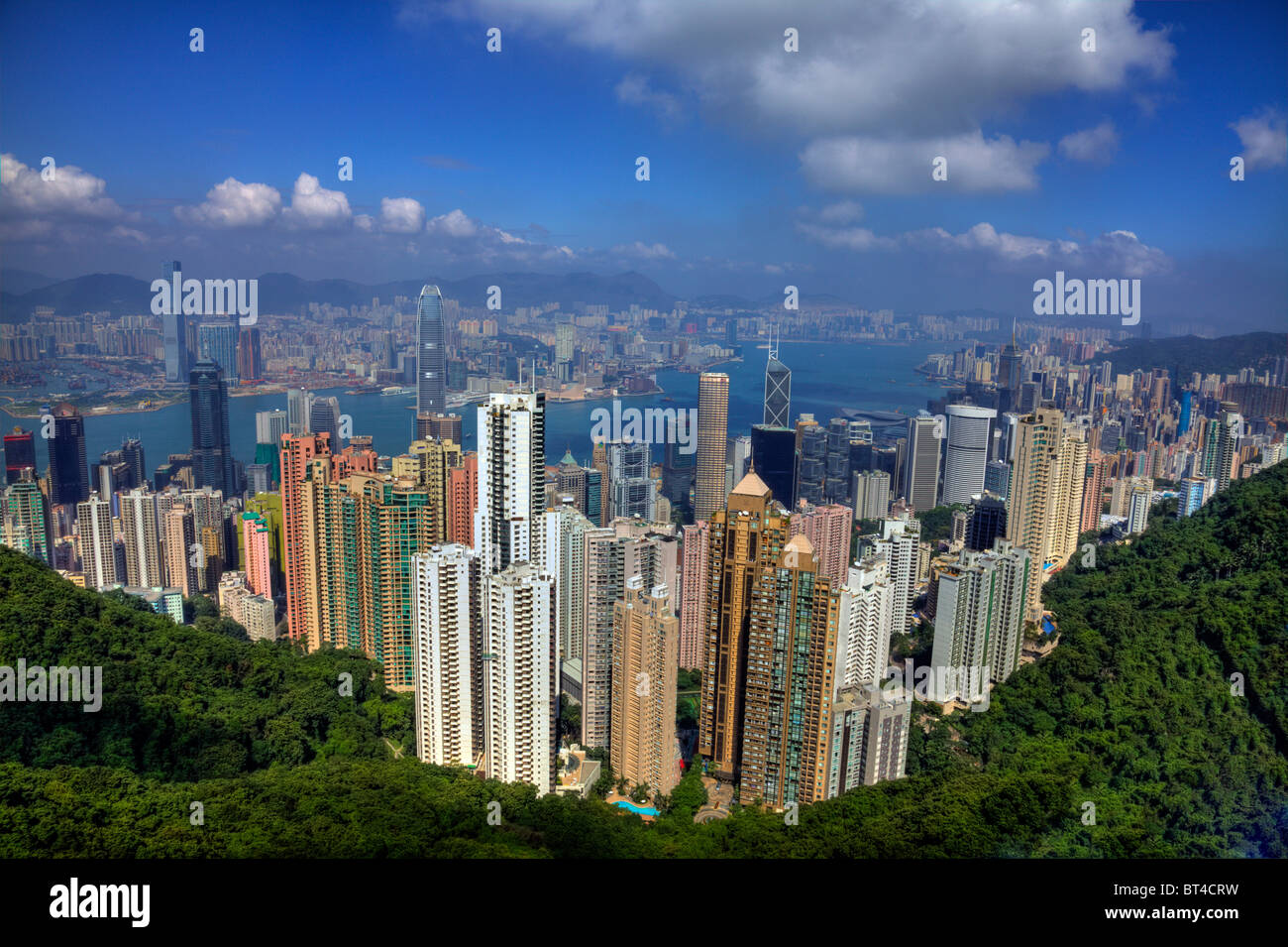 The Peak overlooking Hong Kong and Kowloon on a rare clear day including Victoria Harbour, city overview from high Stock Photo