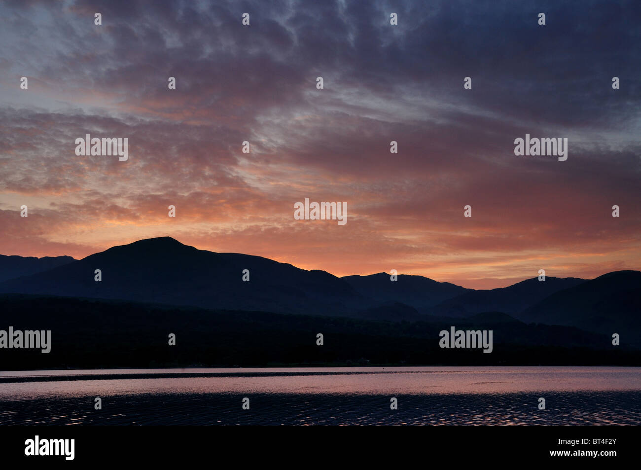 Dramatic sunset sky over Coniston Water and the Old Man of Coniston