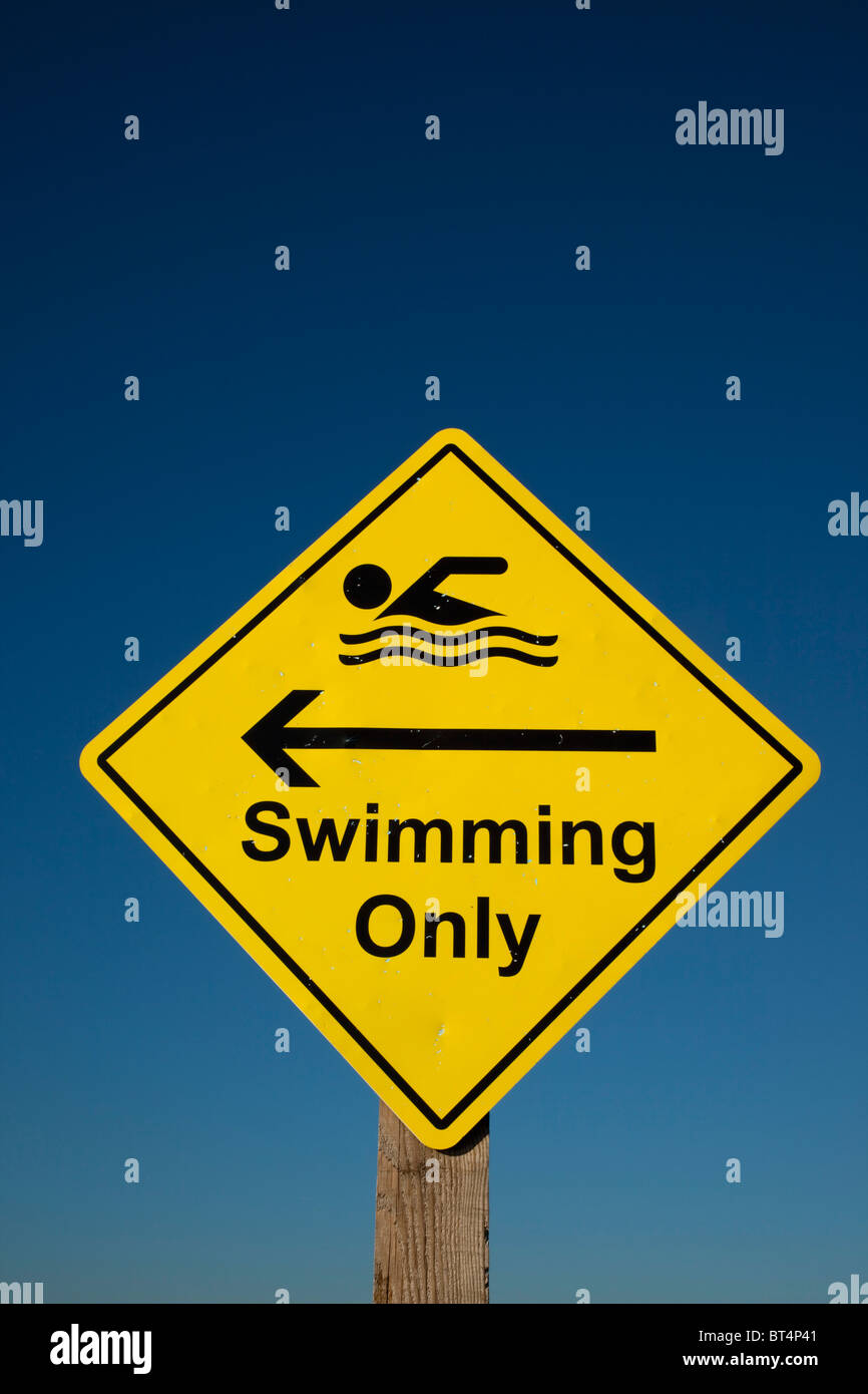 Signs, Warning, Swim area indicating stretch of beach suitable for safe swimming Stock Photo Alamy