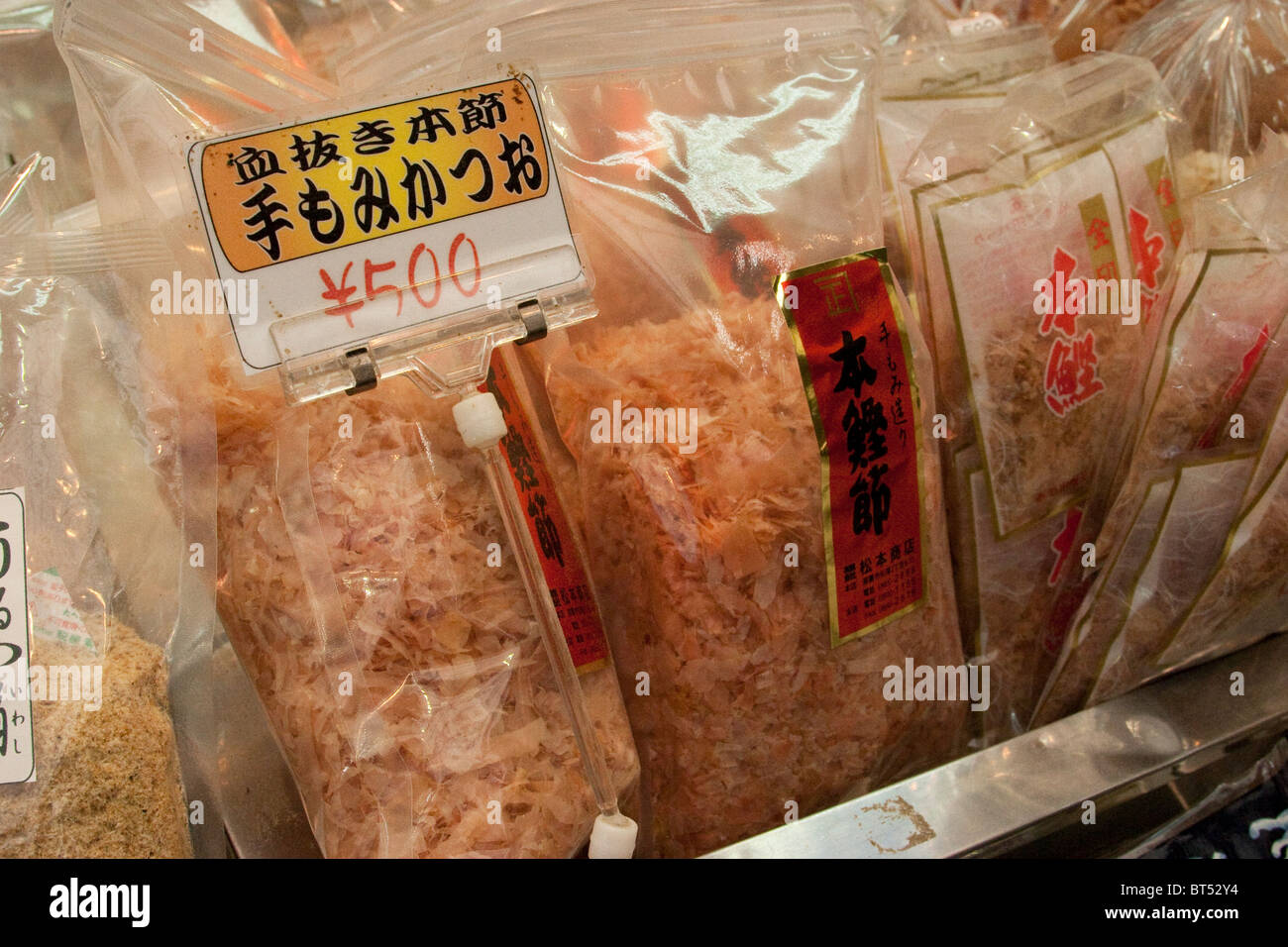 Bags of Katsuobushi shavings, dried, fermented and smoked skipjack tuna, also known as bonito fish, in market in Okinawa Japan Stock Photo