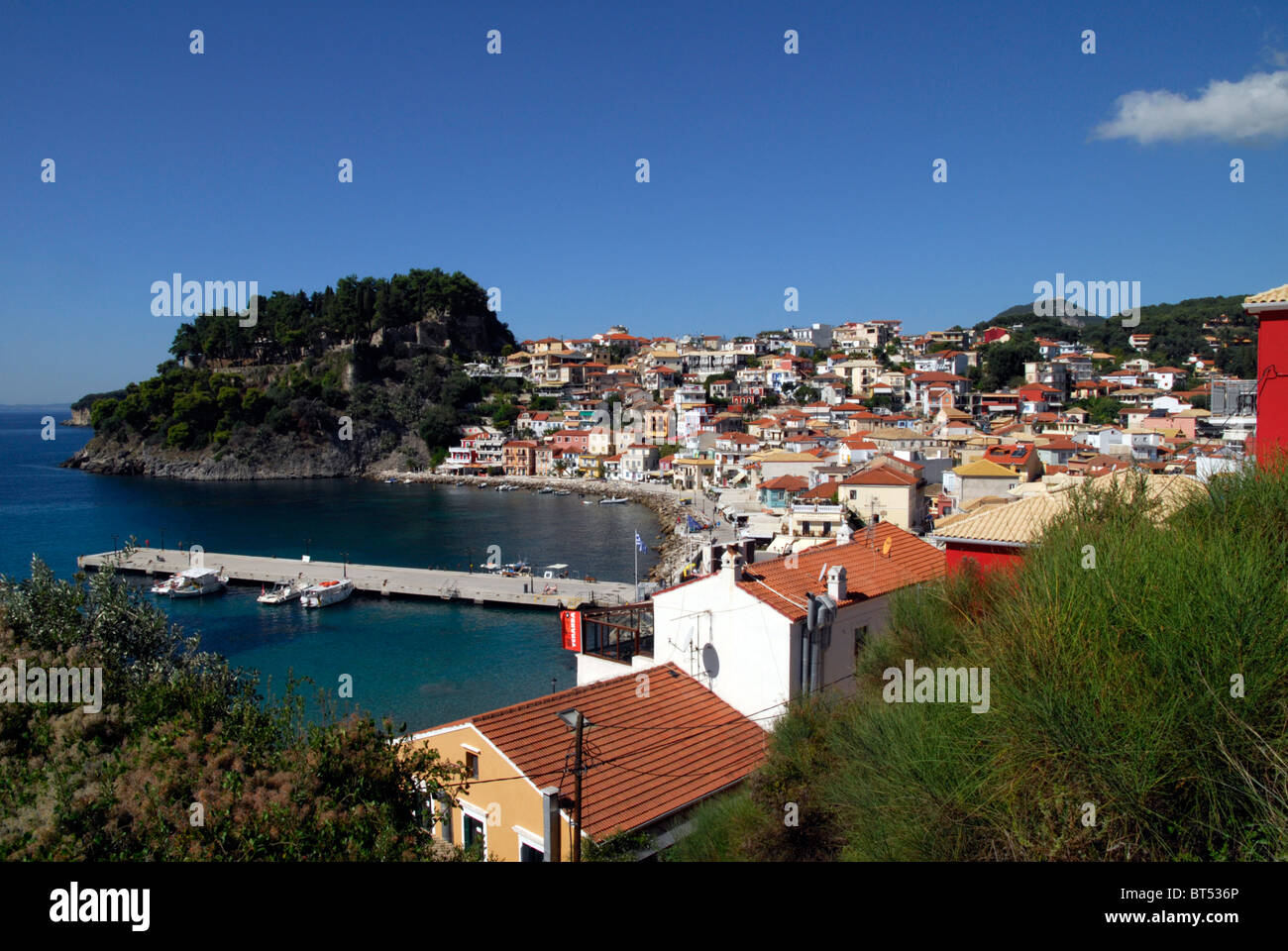 Parga, Epirus, Greece, showing the harbour, old town and Venetian Castle Stock Photo