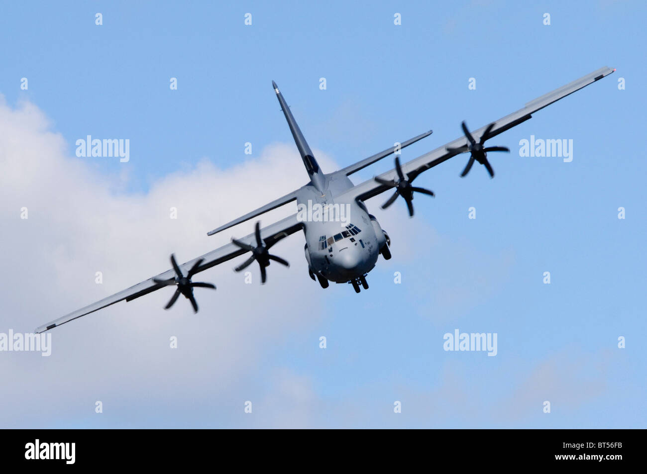 Lockheed C-130J Hercules operated by the US Air Force demonstrating a Khe Sahn landing approach at Farnborough Airshow Stock Photo