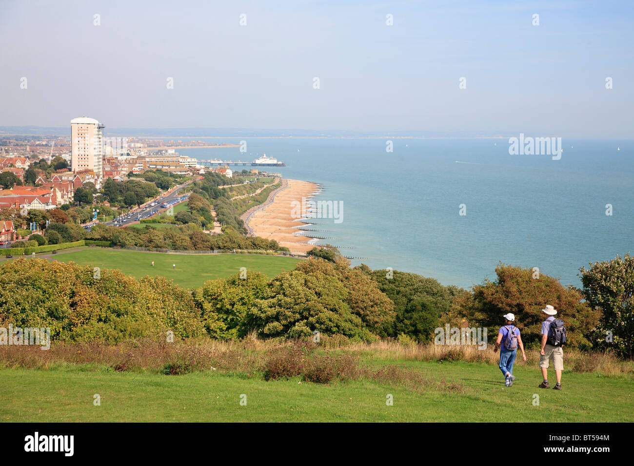 Two walkers on the South West way approach Eastbourne Stock Photo
