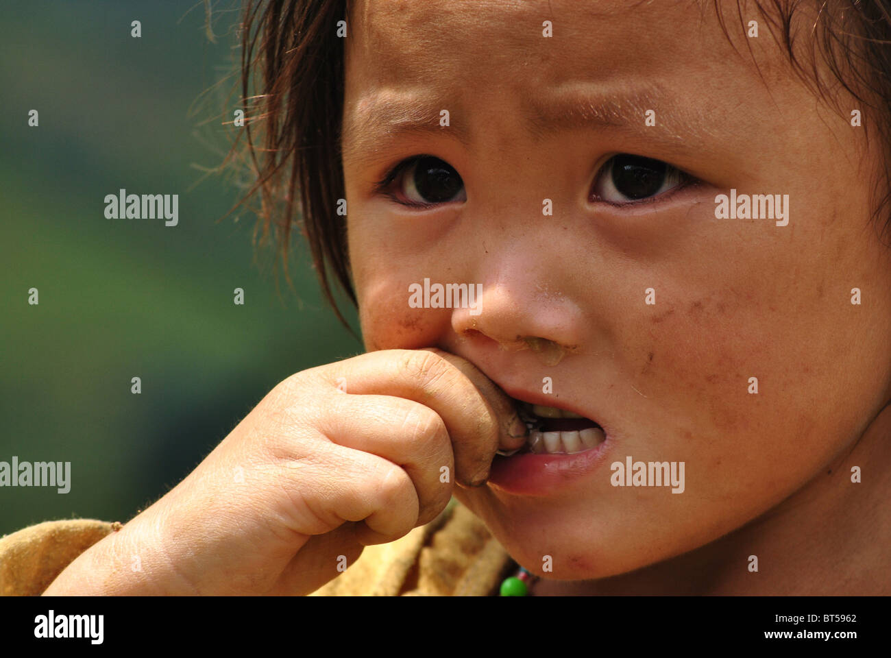 Portrait of young girl near Sapa, Vietnam Stock Photo