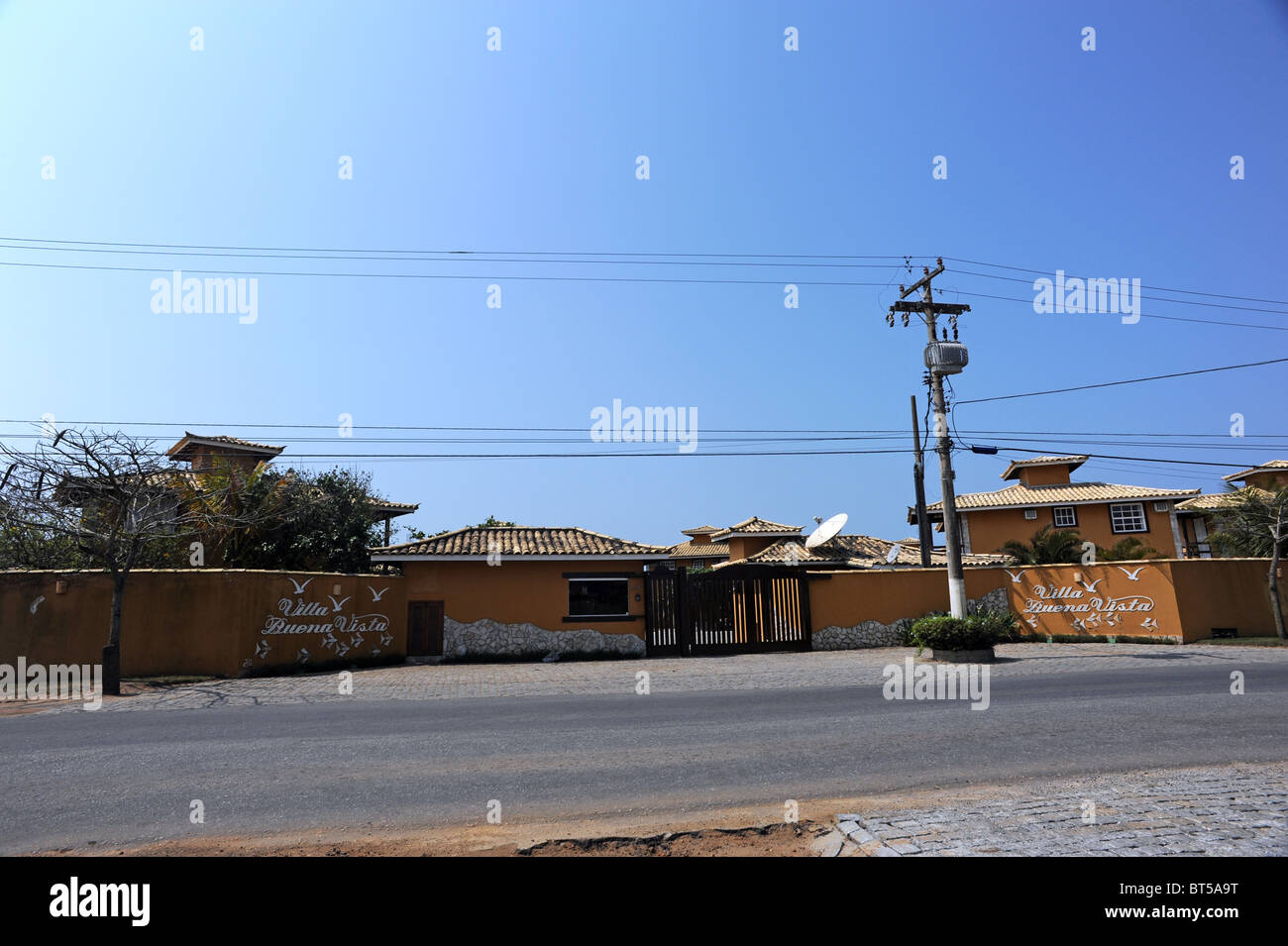 Gated entrance to a condominium complex of houses and holiday villias in Buzios Stock Photo