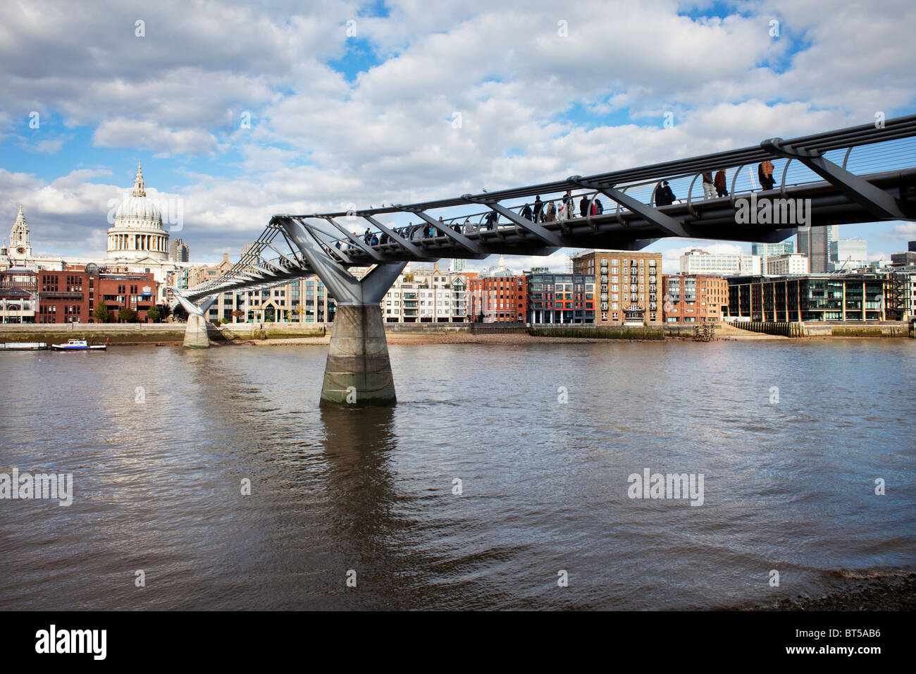 The Millennium Bridge in London, UK. St Paul's Cathedral is in the background. Stock Photo
