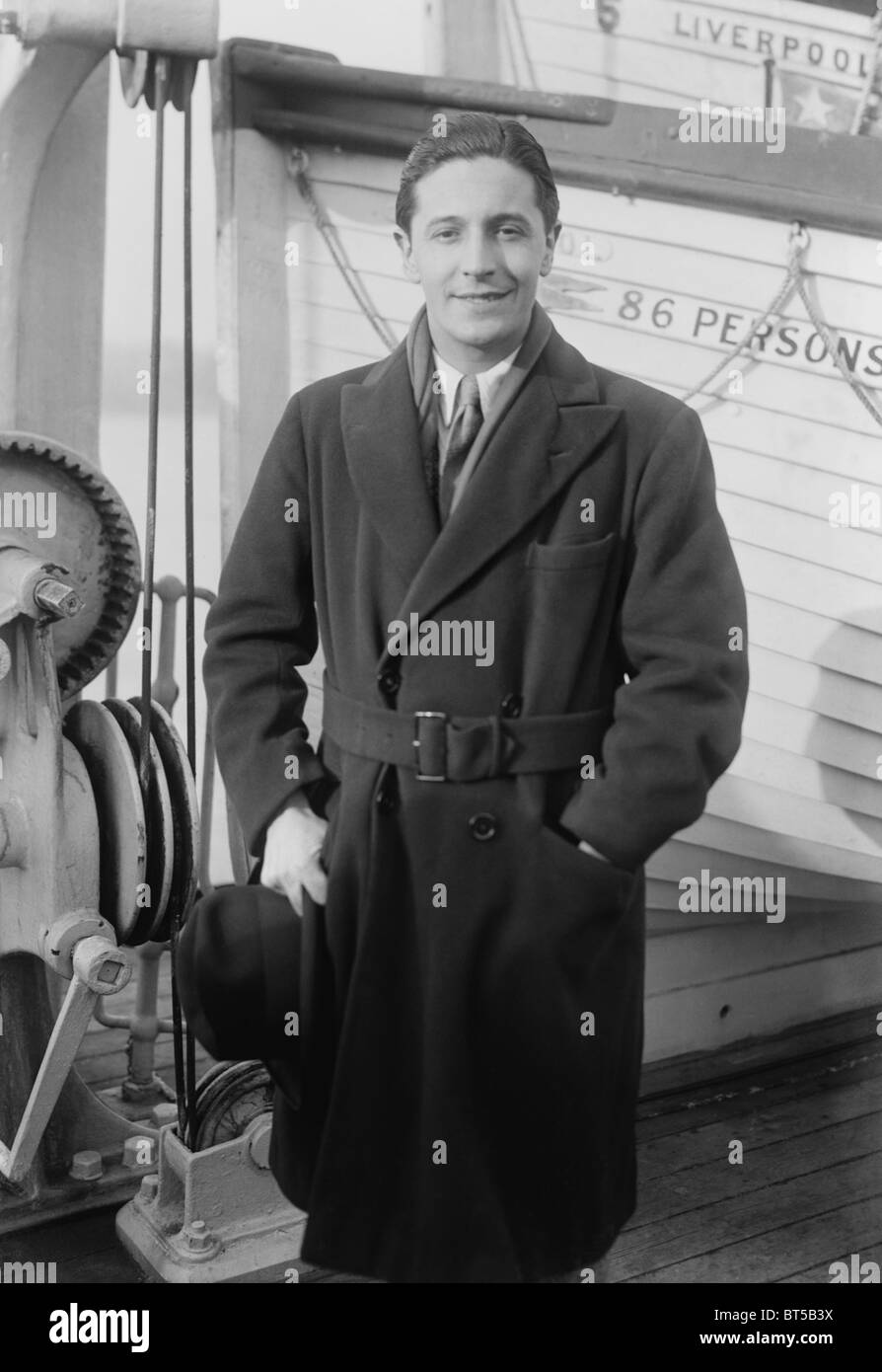 Vintage photo circa 1922 of Welsh composer, singer and actor Ivor Novello (1893 - 1951) on board a ship arriving in New York. Stock Photo