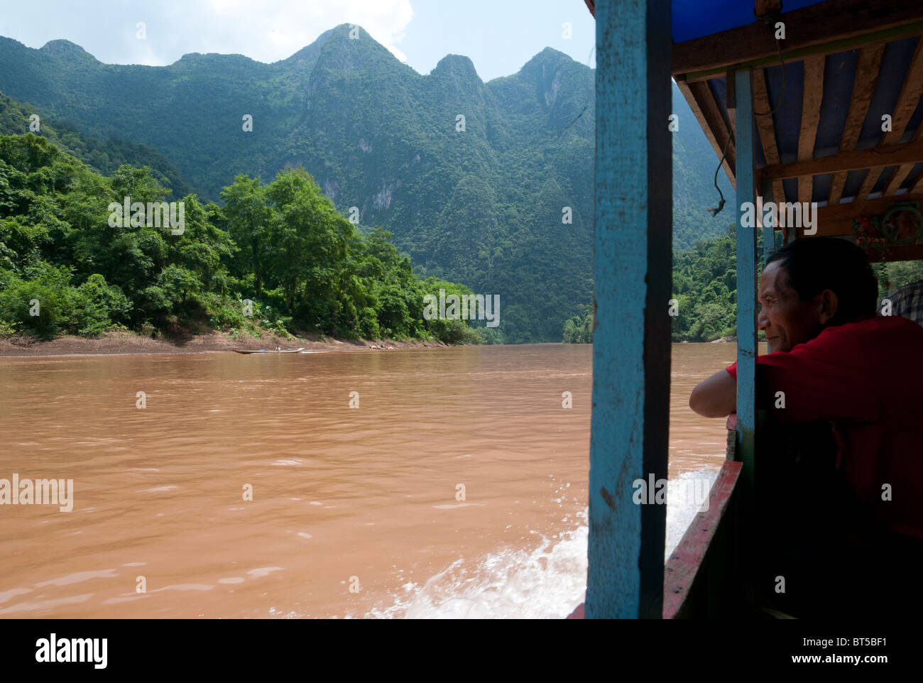 Tail Boat Trip along the Nam Ou River from Hat Sa to Nong Khiaw. Northern Laos Stock Photo