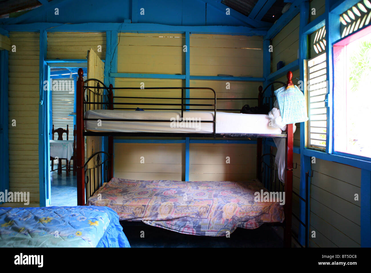 Bedroom with a bunk bed inside of a real family home in the Dominican