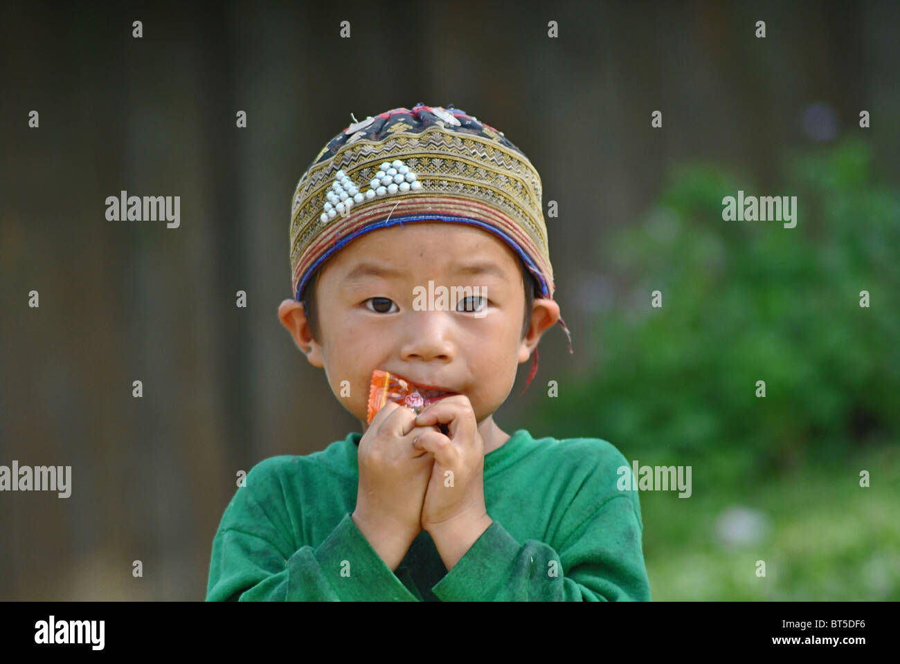 Ethnic Red Dao child near Sapa, Vietnam Stock Photo
