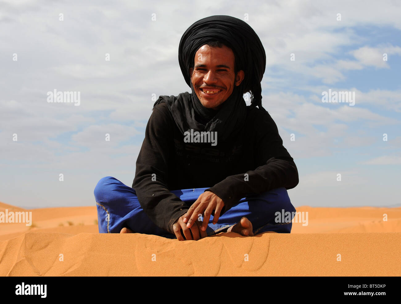 Portrait of a nomadic Bedouin in the Sahara desert in Morocco Stock