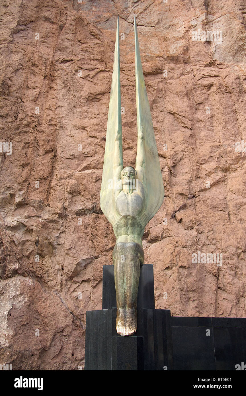 One of the 30-foot tall statues at the Hoover Dam named "Winged Figures of the Republic" by the sculptor Oskar J.W. Hansen. Stock Photo