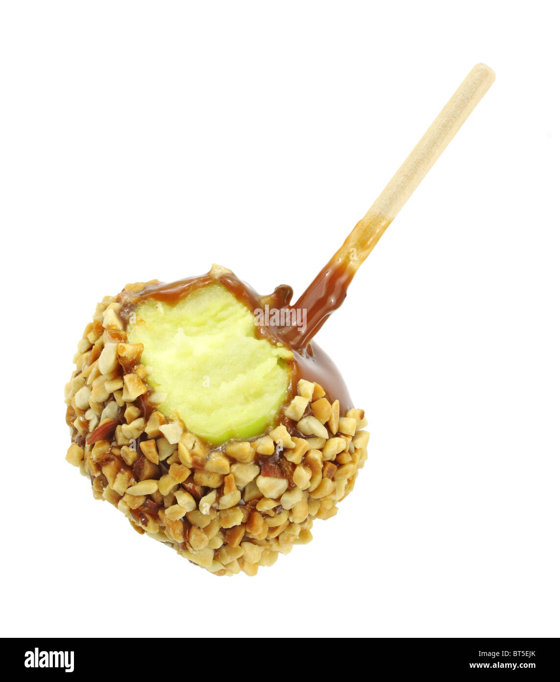 Caramel coated apple that has been bitten Stock Photo