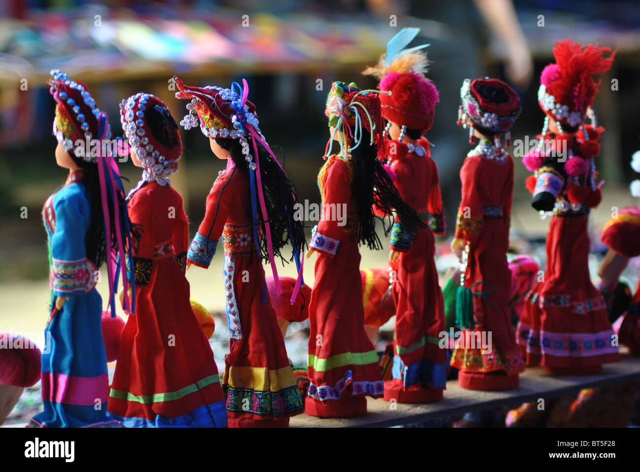 Souvenir models of Flower Hmong people at Bac Ha market, Vietnam Stock Photo