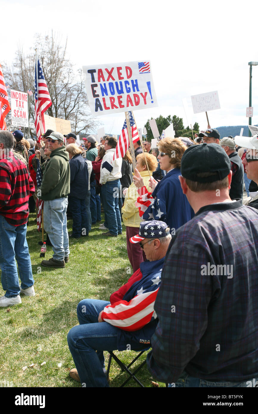 People holding signs and flags, TEA Party rally at Coeur D Alene, Idaho ...