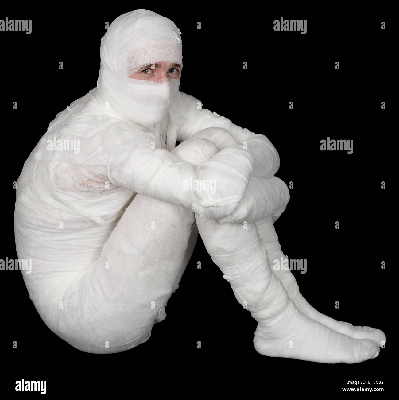 Man in bandage on the black background Stock Photo - Alamy