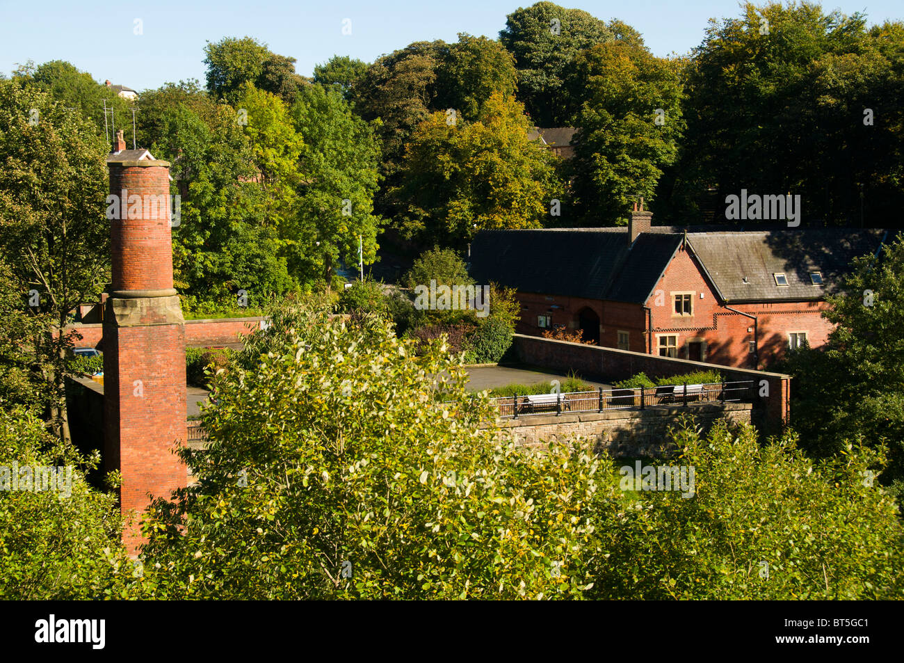 Old factory chimney and the Park Bridge Heritage Centre (formerly