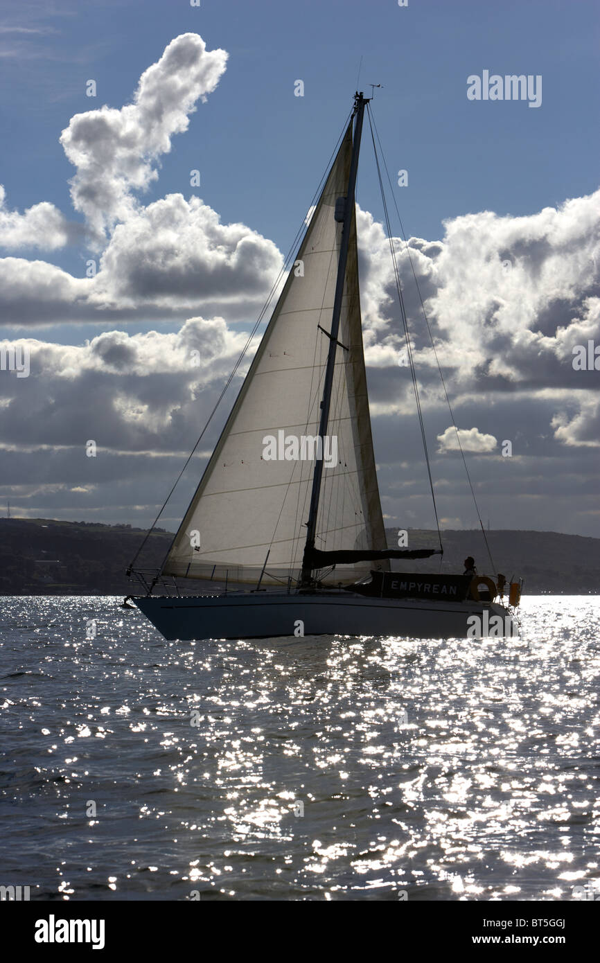 yacht under sail across belfast lough northern ireland uk Stock Photo