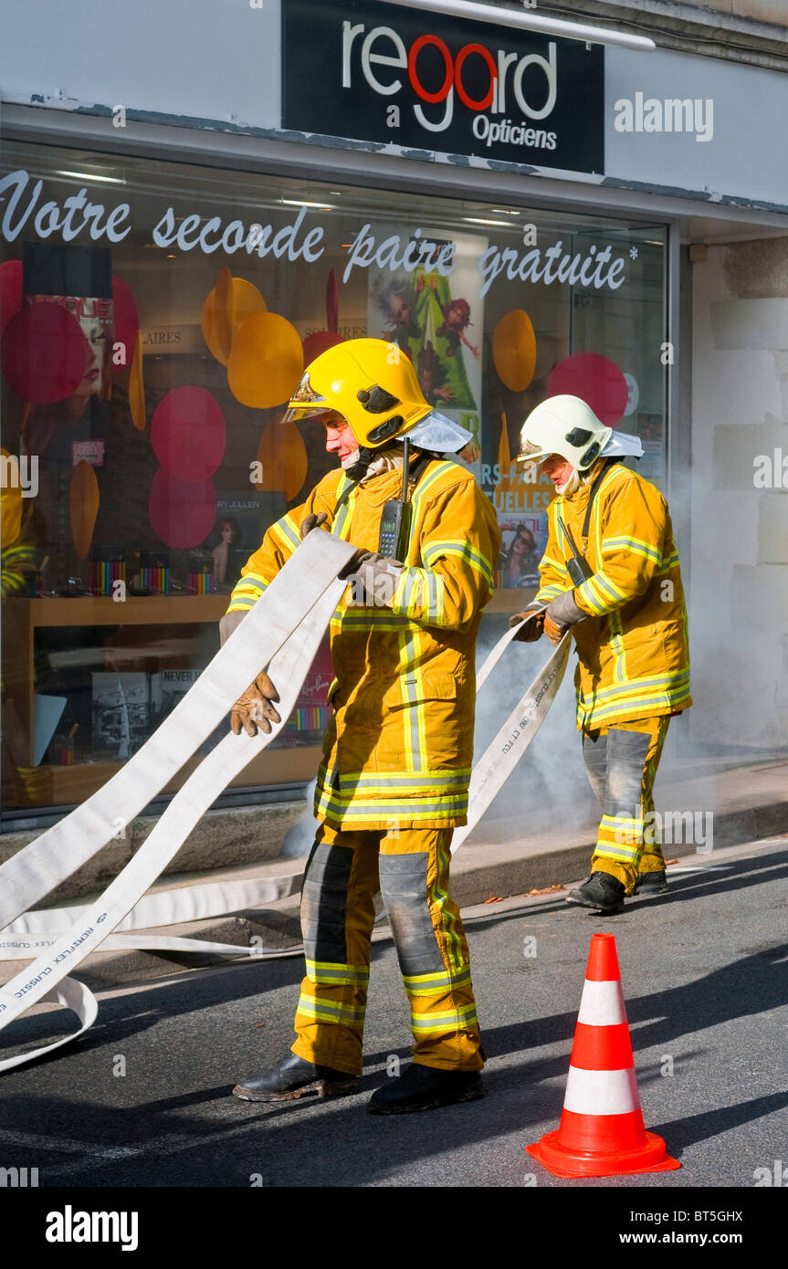 Trainee firemen on exercise - France. Stock Photo