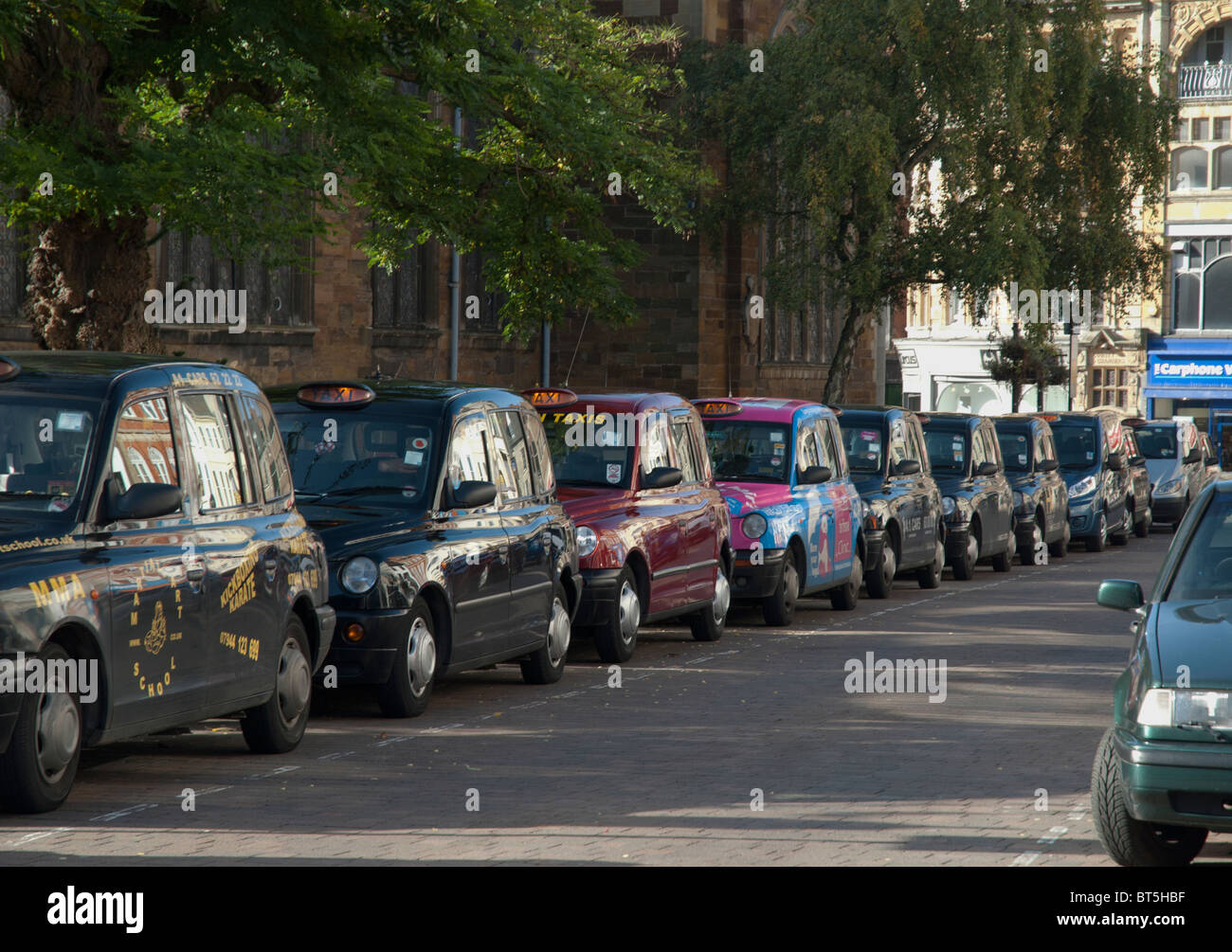 Taxis Lined Up and Waiting Stock Photo
