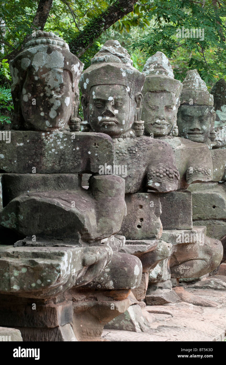 Ancient buddha statues on bridge angkor thom hi-res stock photography ...