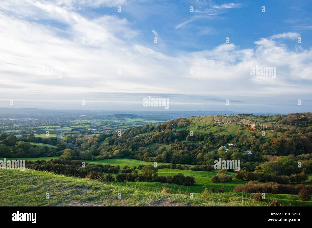 Crickley Hill, Severn Vale, Golden Valley and Churchdown Hill - from Barrow Wake - part of the Cotswold Way, Gloucestershire, UK Stock Photo