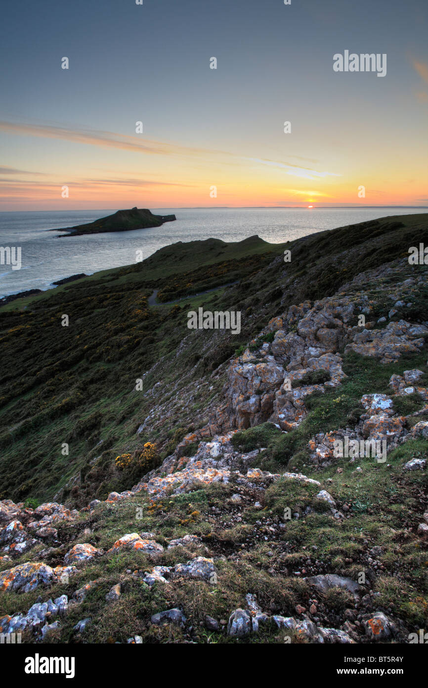 Sunset at Worms Head, The Gower, Wales. Stock Photo