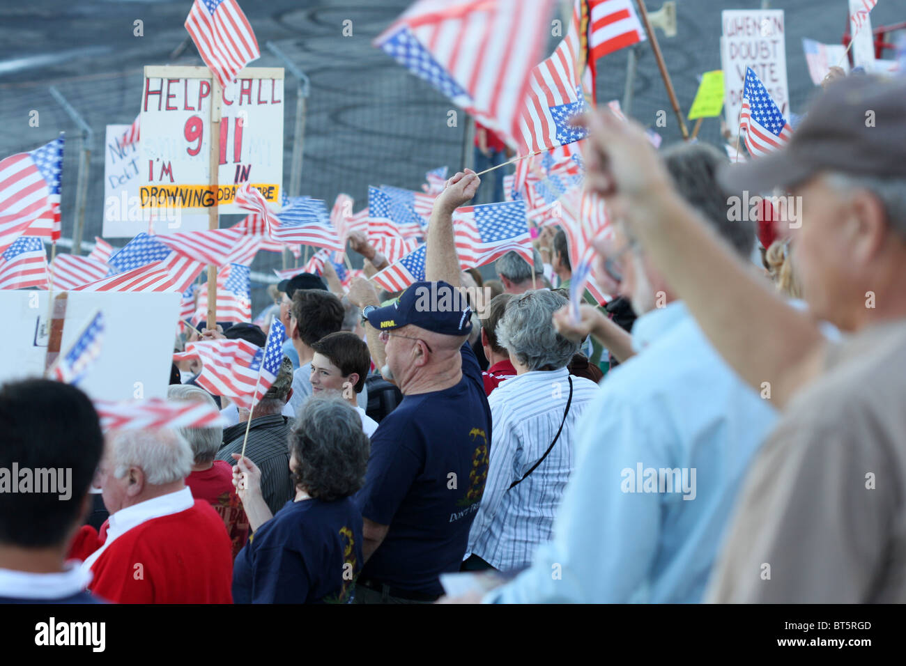 People holding signs and flags, TEA Party rally at Stateline, Idaho ...