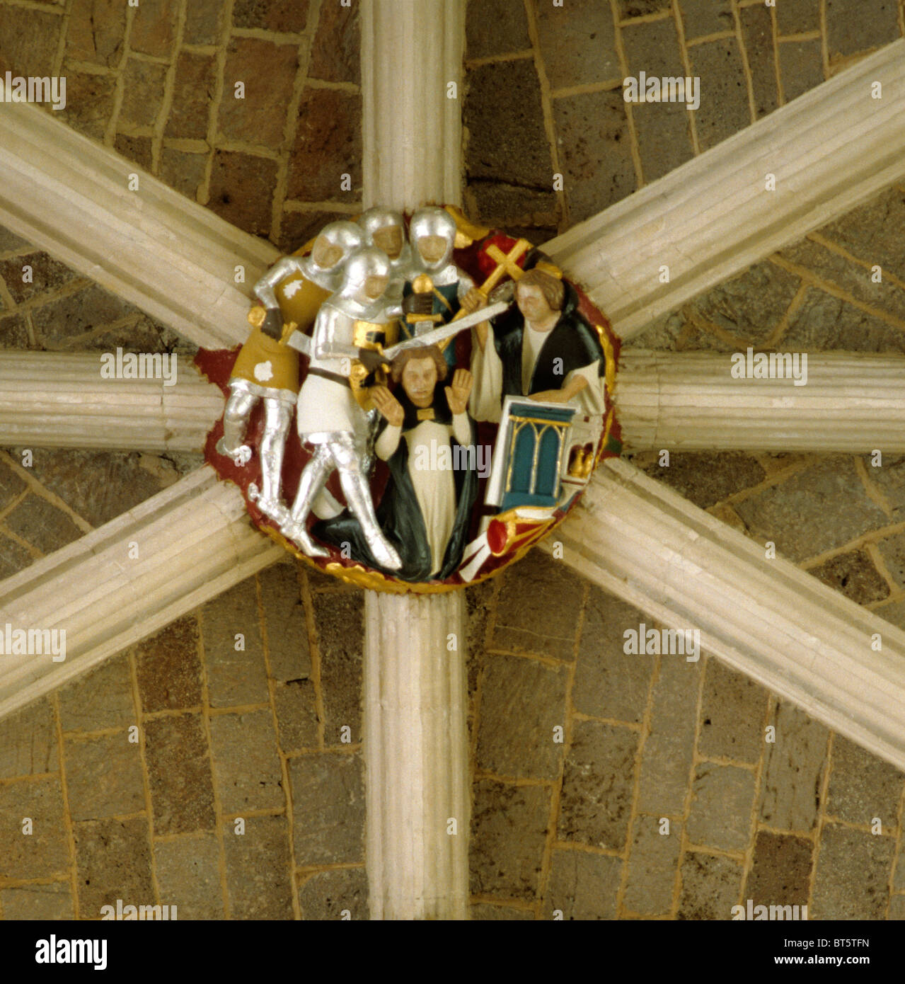 Exeter Cathedral nave roof boss Murder of Thomas Becket Archbishop of Canterbury medieval stone carving carvings English Stock Photo