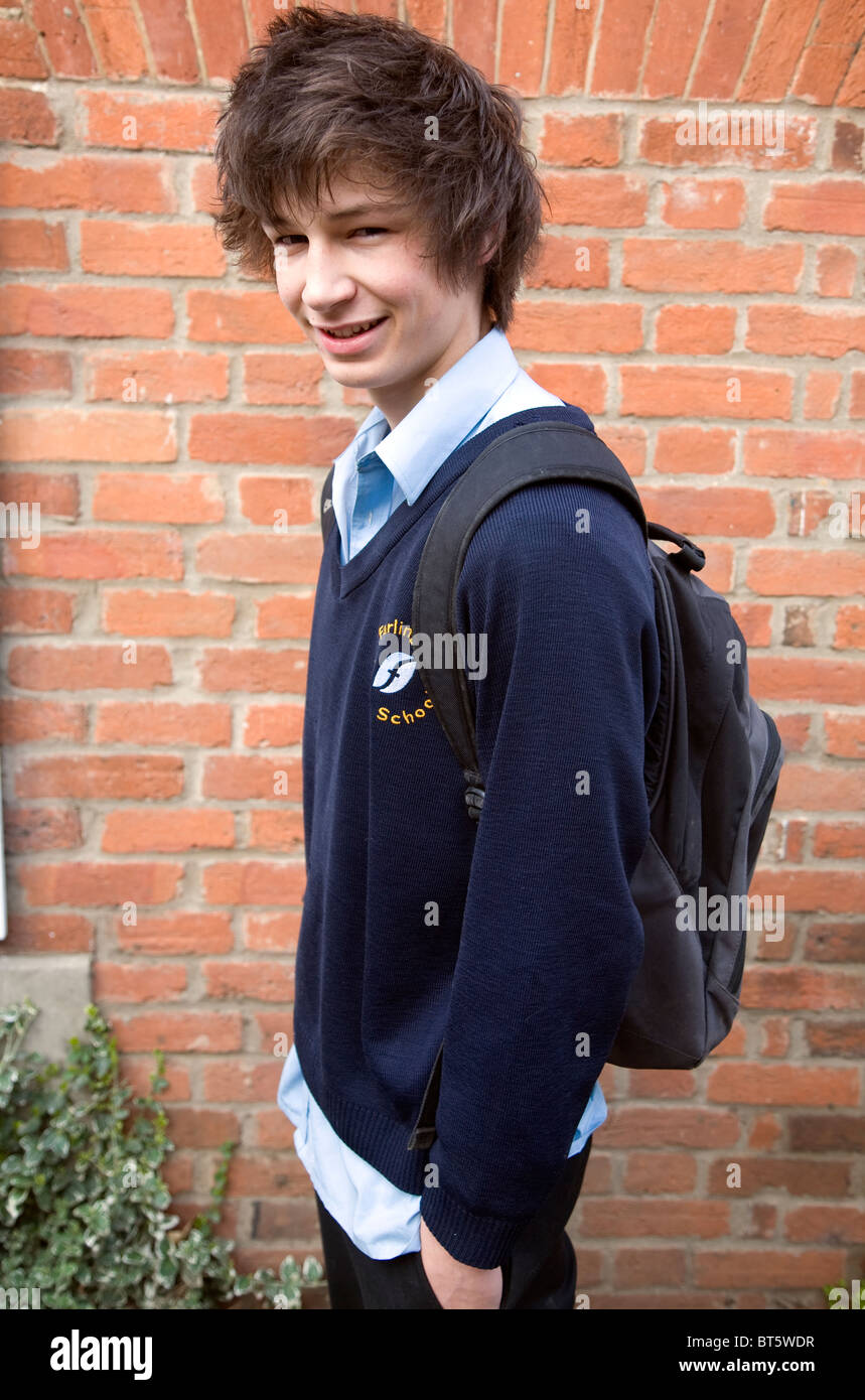 Teenage boy wearing navy blue school uniform Stock Photo