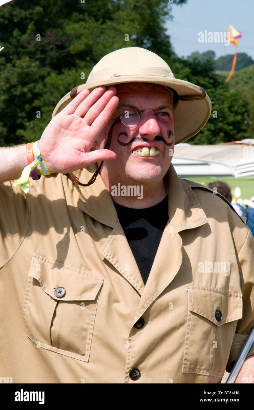 2010 Glastonbury Festival of Contemporary Performing Arts festival Pith helmet explorer khaki army jacket handle bar moustache b Stock Photo