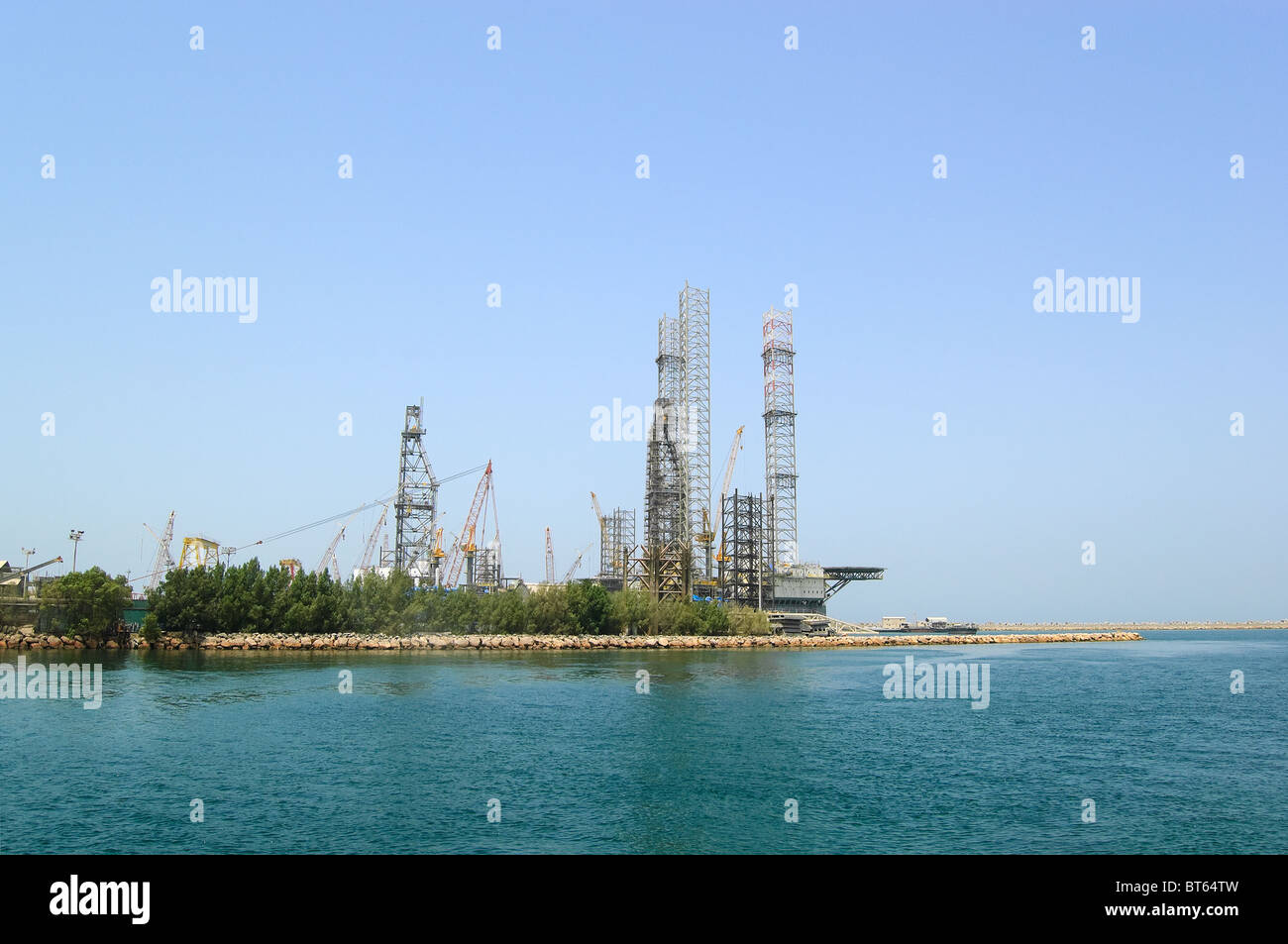Oil drilling site at the shore, Sharjah, United Arab Emirates Stock Photo