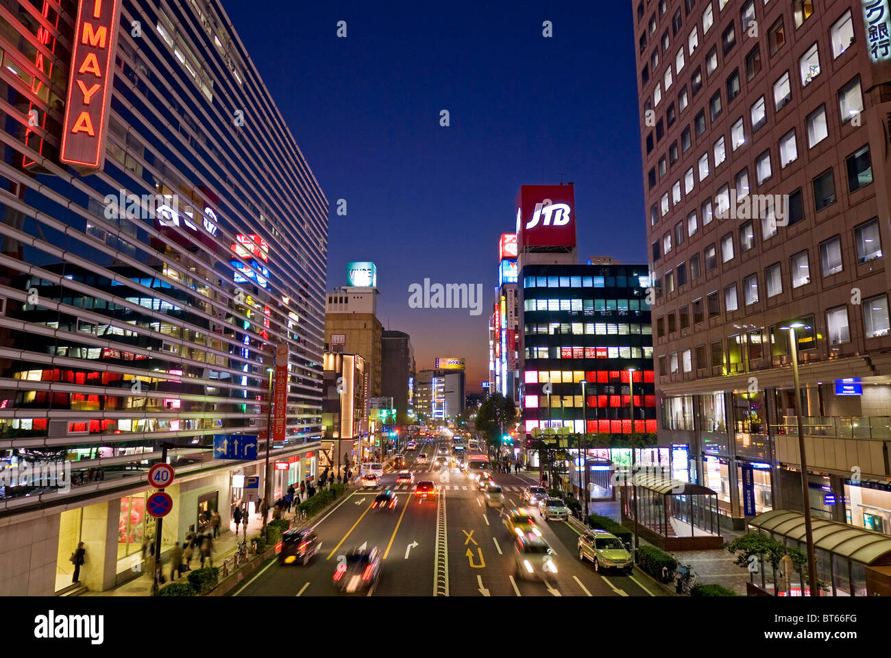 Busy Asian city street in Yokohama, Japan at night. Stock Photo