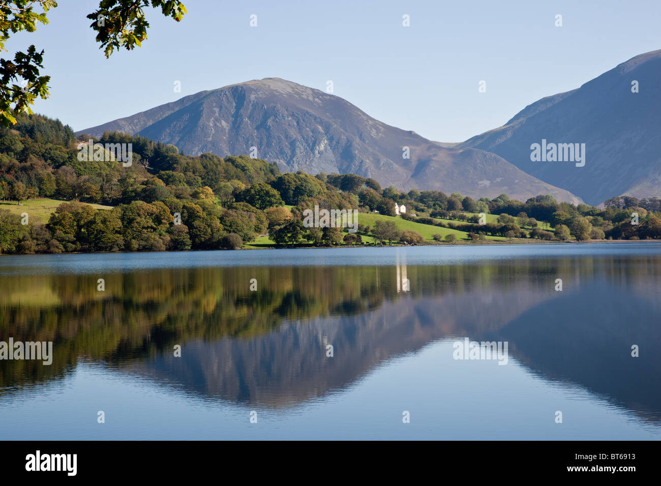 Whiteside reflected in the calm waters of Loweswater near Cockermouth, Lake District, Cumbria Stock Photo