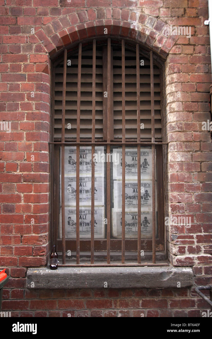 Window with bars on brick building in Melbourne, Australia Stock Photo ...