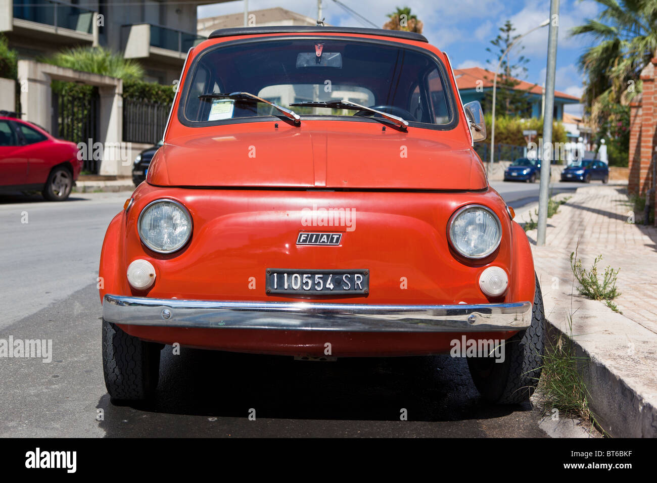 Red Fiat 500 Cinquecento Topolino in Sicily, Italy Stock Photo