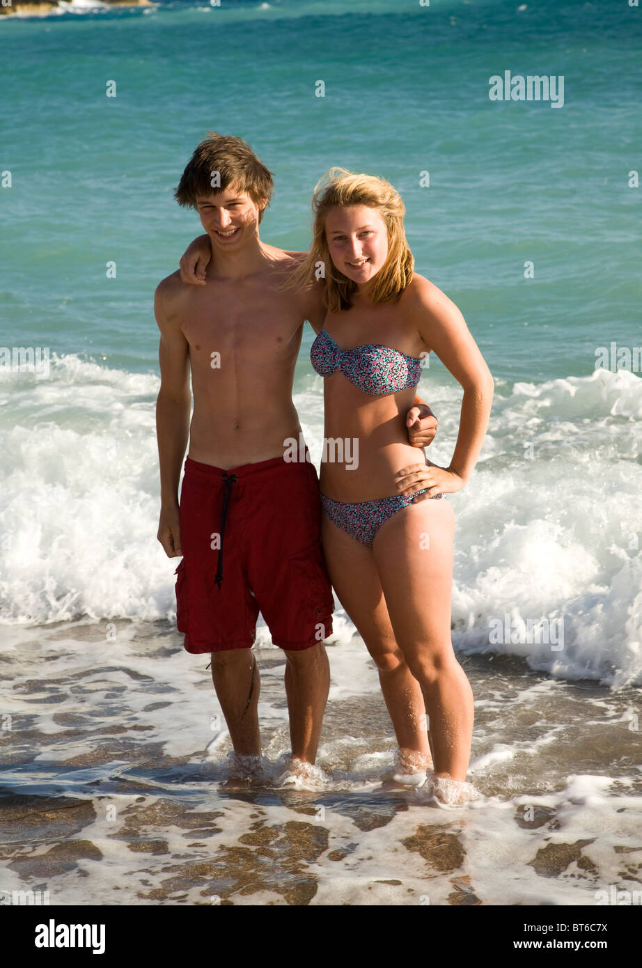 Boy And Girl Twins Stand In Sea Embracing Stock Photo Alamy