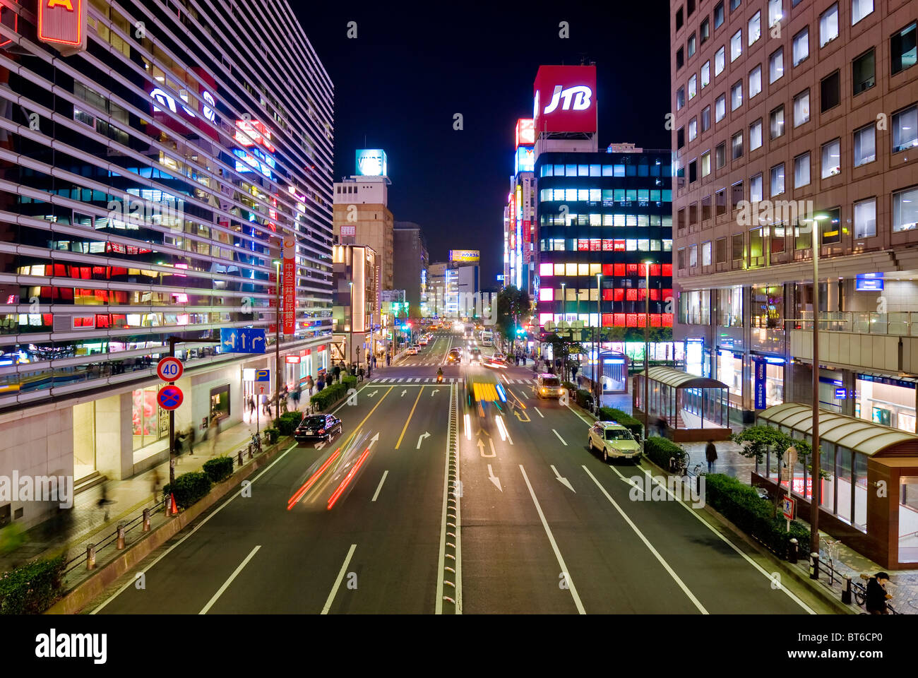 Busy Asian city street in Yokohama, Japan at night. Stock Photo