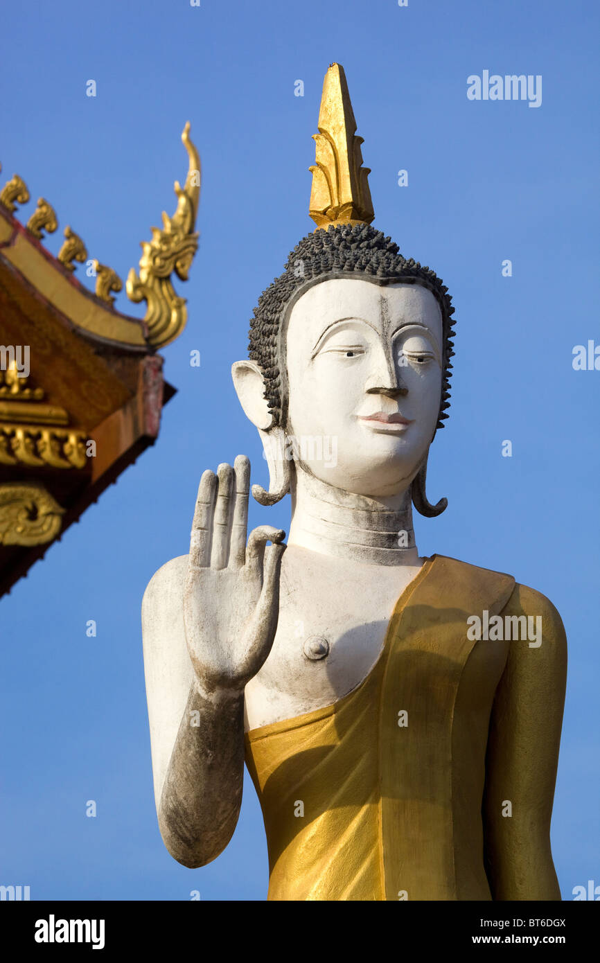 Budha Statue outside Wat That Luang Neua Vientiane Laos Stock Photo