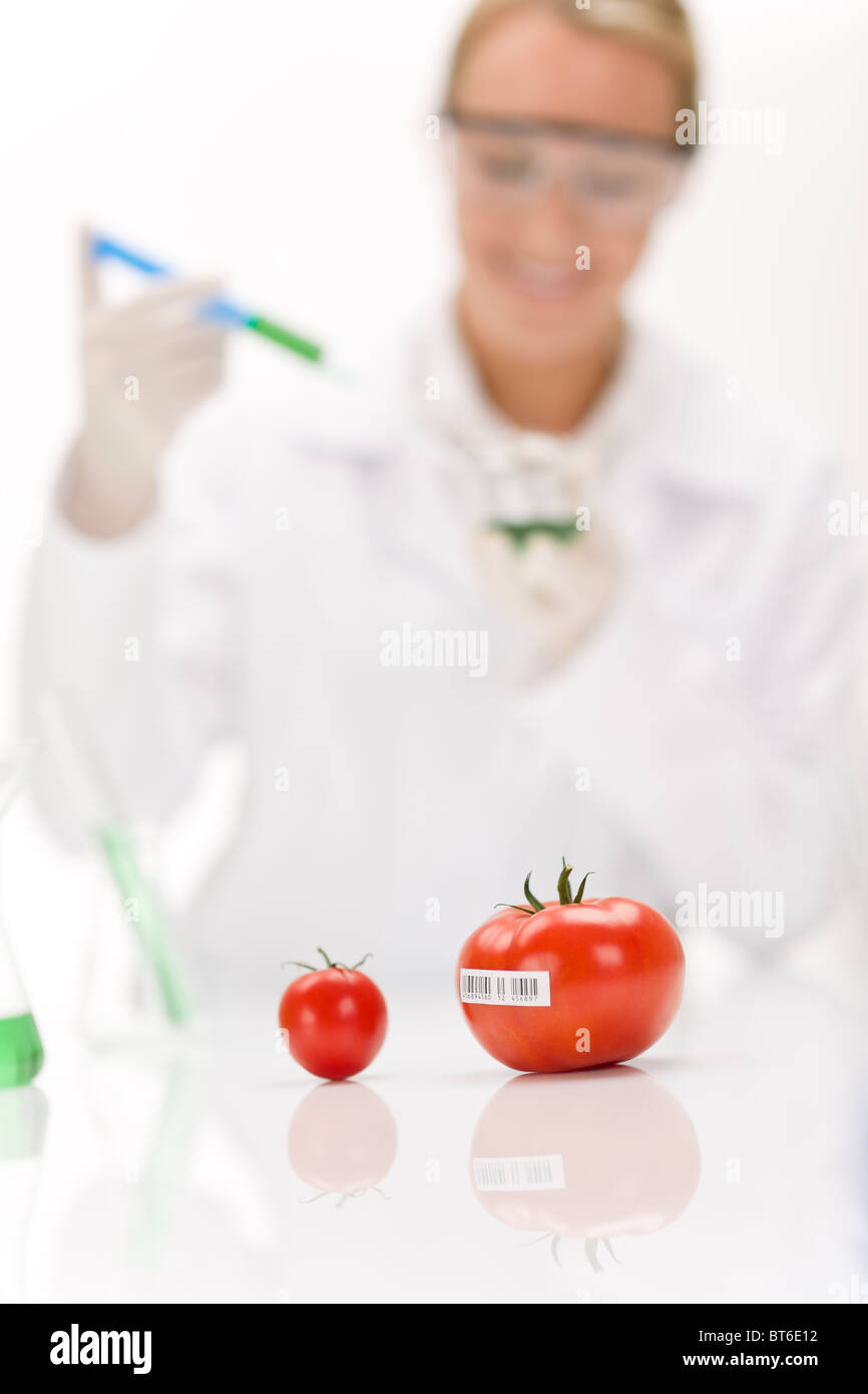 Genetic engineering - scientist in laboratory, GMO testing experiment Stock Photo