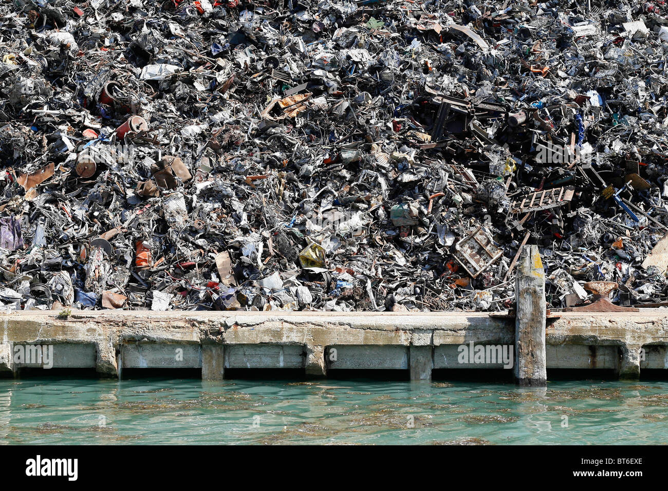 Piles of scrap metal on an industrial estate in Brighton, England Stock