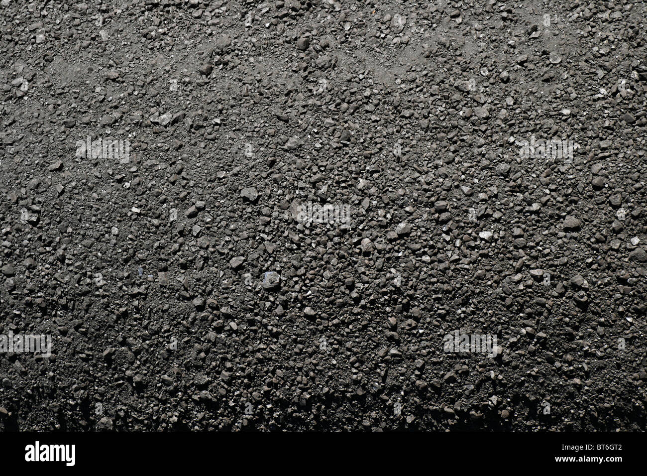 background image of a coal pile taken from above Stock Photo