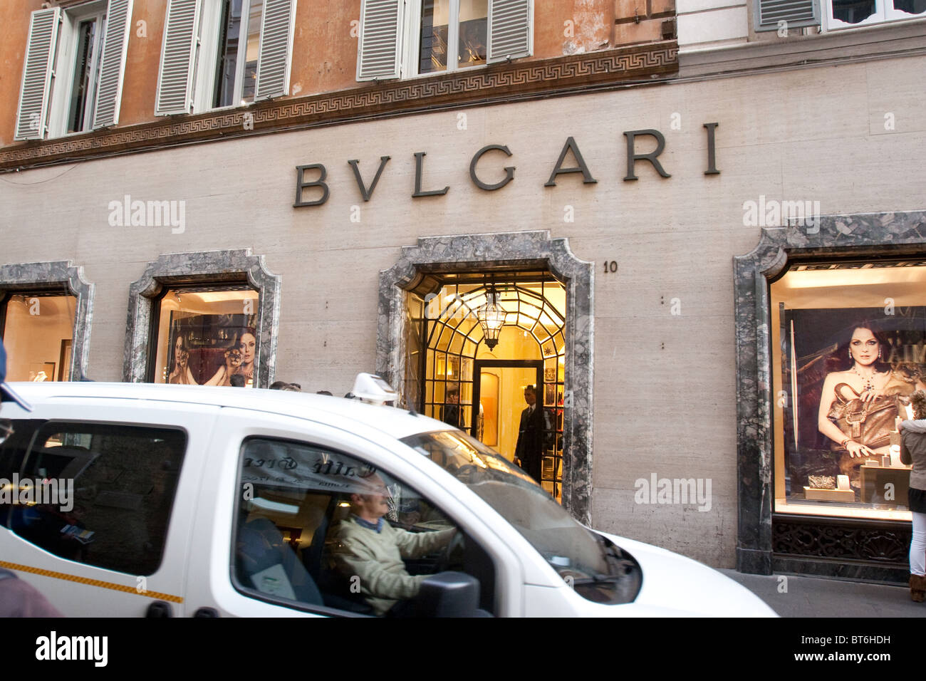 via Condotti Rome Bulgari store shop gold jewelry window entrance Rome street fashion gold jewelry exterior street Lazi Stock Photo