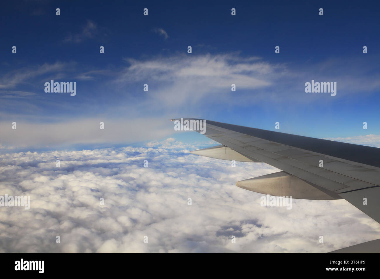 Blue sky with airplane hi-res stock photography and images - Alamy