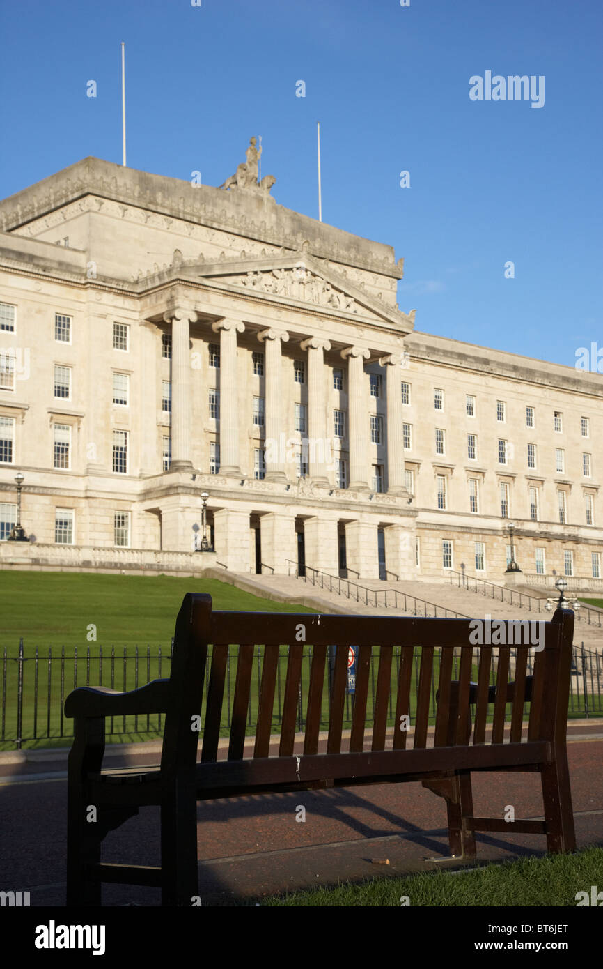 empty park bench outside the northern ireland parliament buildings stormont belfast northern ireland uk Stock Photo